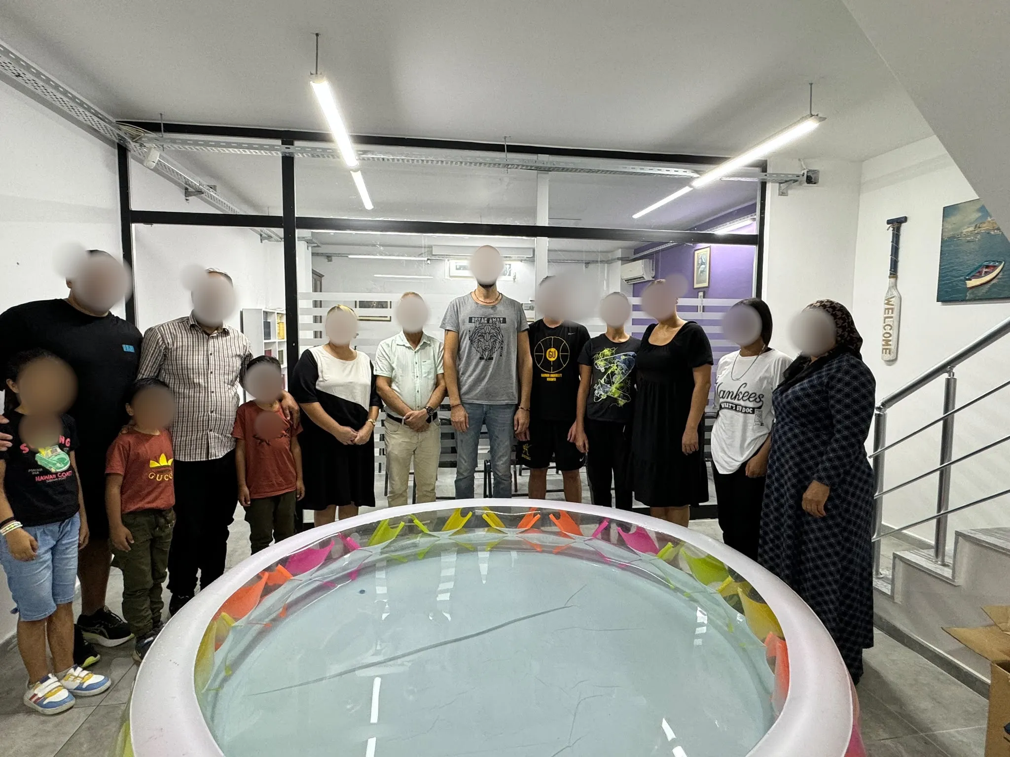 The church family gathered for a baptism