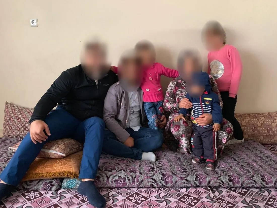 A home visit with a refugee family